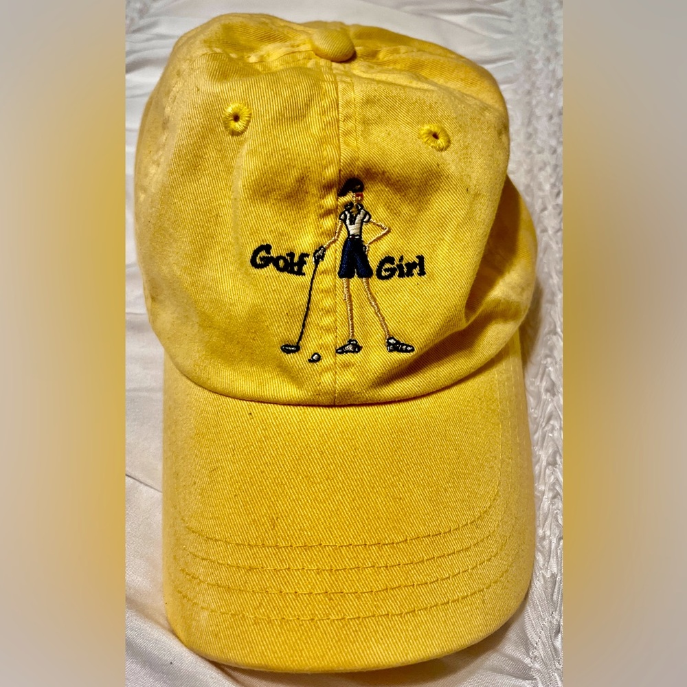 The Girls woman’s yellow embroidered “Golf Girl hat w Velcro band